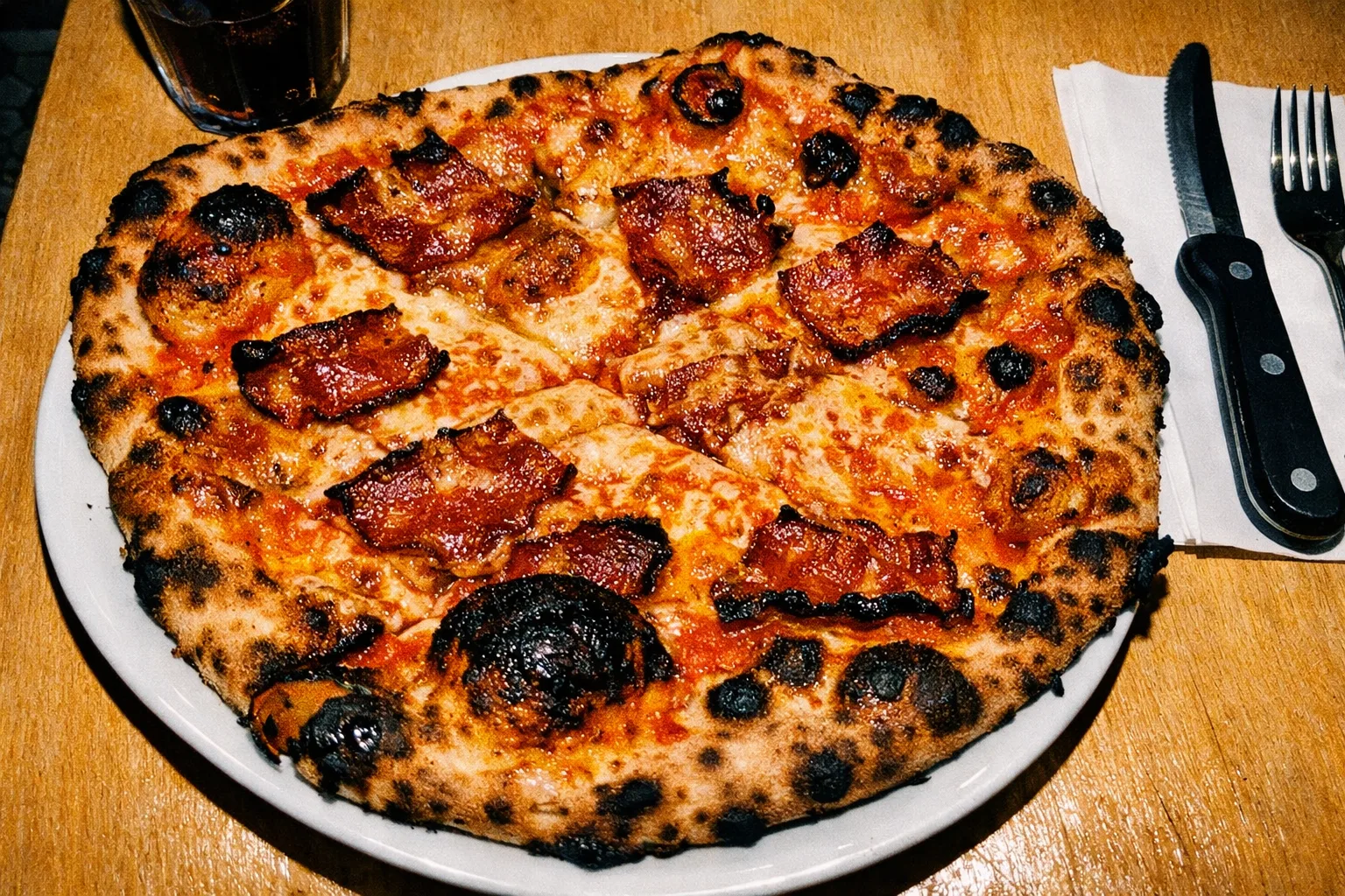 Hot honey bacon pizza with signature char